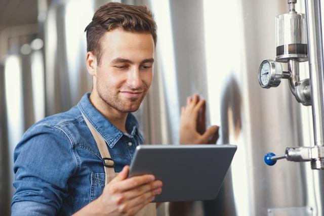 Estimator reviewing a hydraulic takeoff on a tablet